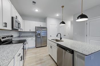 Large kitchen islands with storage and pendant lighting*